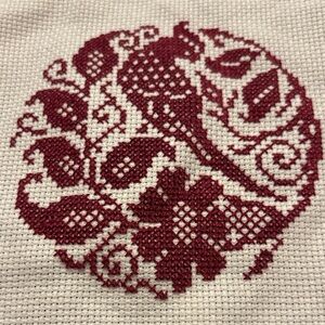 Completed Red Bird and Floral Cross stitch piece